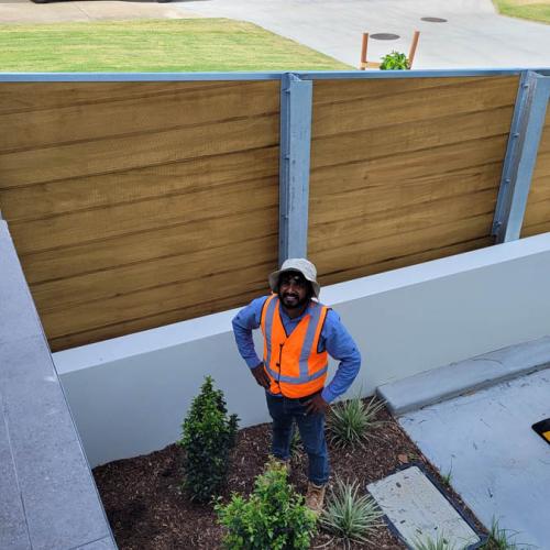 One of our surveyors in rear courtyard doing final checks