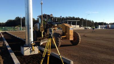 Robotic Total Station to assist in guiding a grader operator